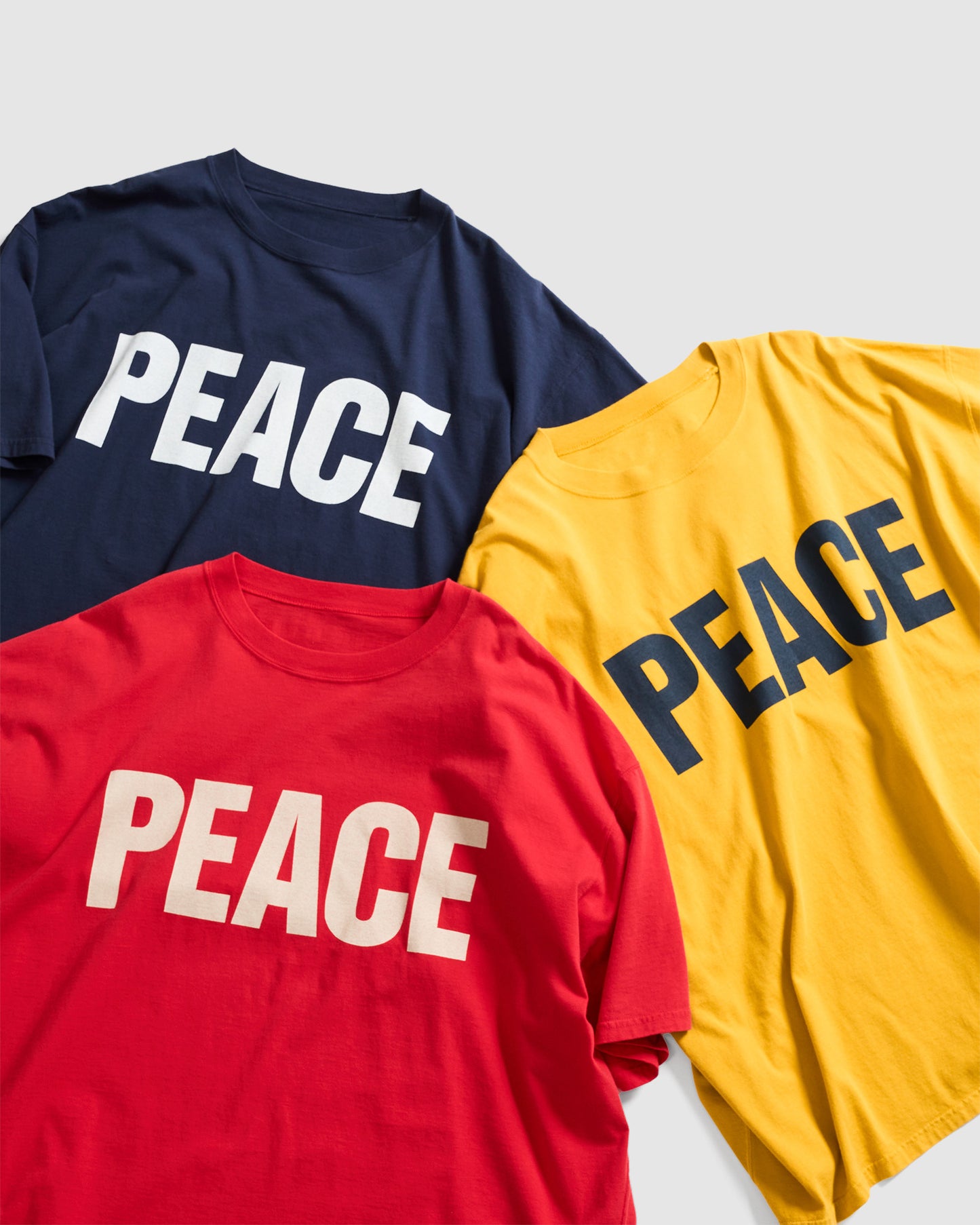SLOGAN TEE PEACE RED